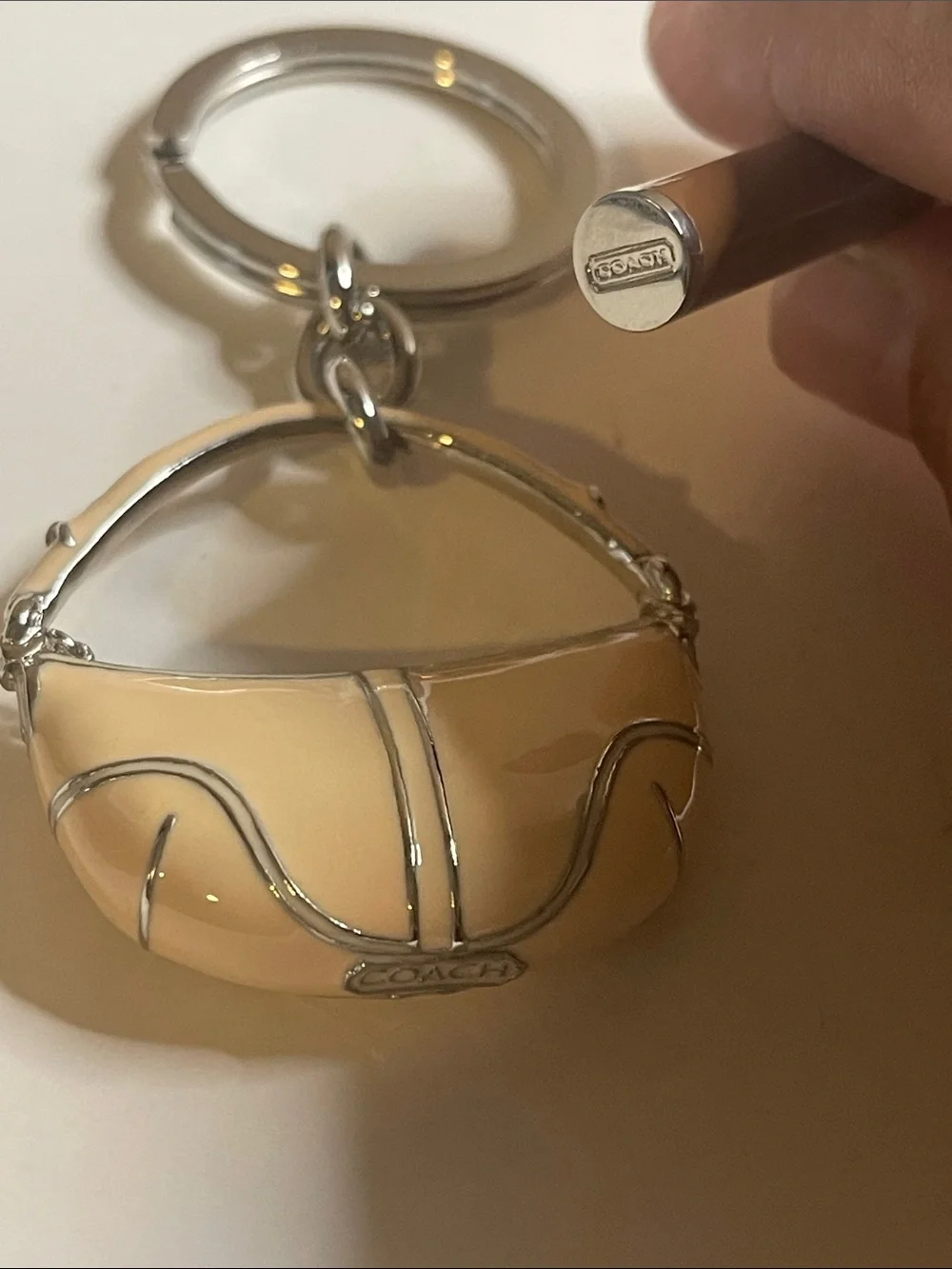 Coach Beige Enamel Handbag Keychain and Coach Pen